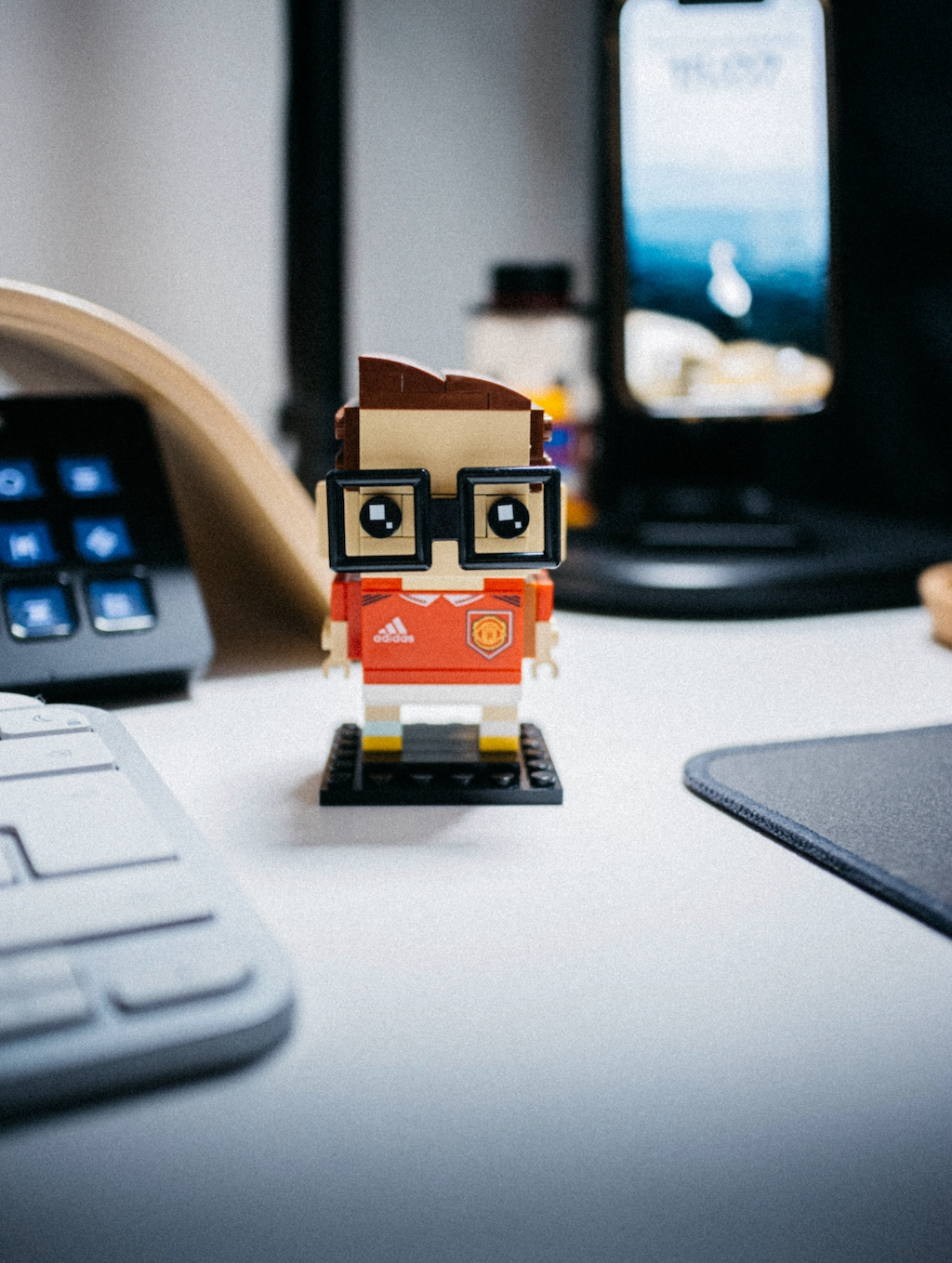 A LEGO figure on a desk